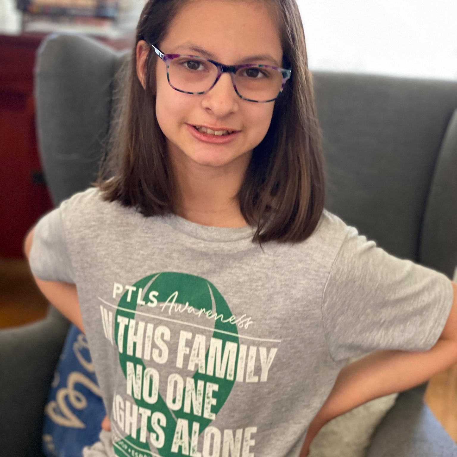 Girl wearing PTLS t shirt